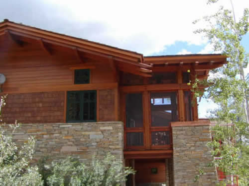 Redwood timbers and beams provide a natural look for this rustic home.