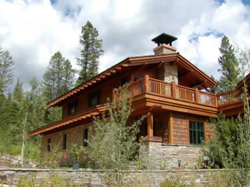 Redwood beams and timbers are integral tthe design of this mountain home.