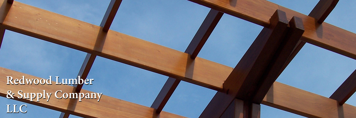 Redwood boards and beams combine to create a beautiful soffit detail on a custom home.