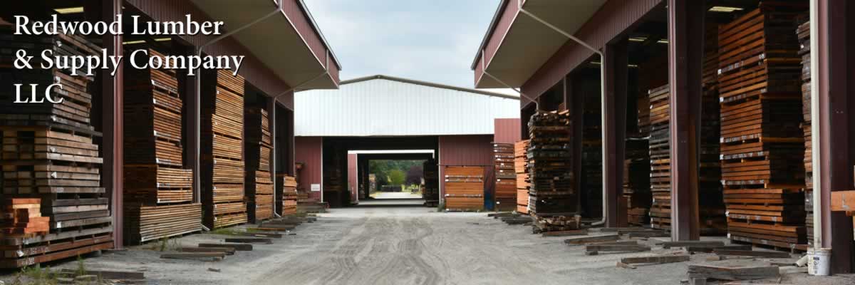 Redwood boards and beams combine to create a beautiful soffit detail on a custom home.